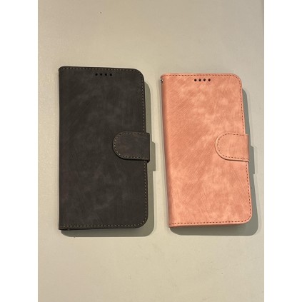 Bilde av lommebok deksel / mobil wallet. svart til venstre rosa til høyre.